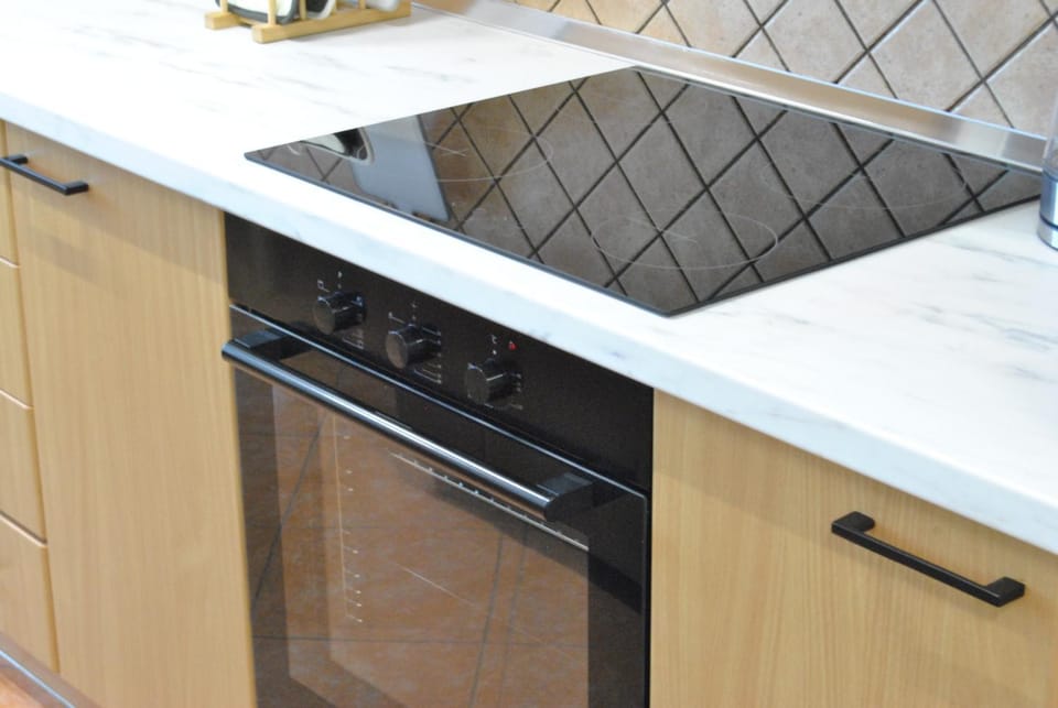 Kitchen or kitchenette, stove