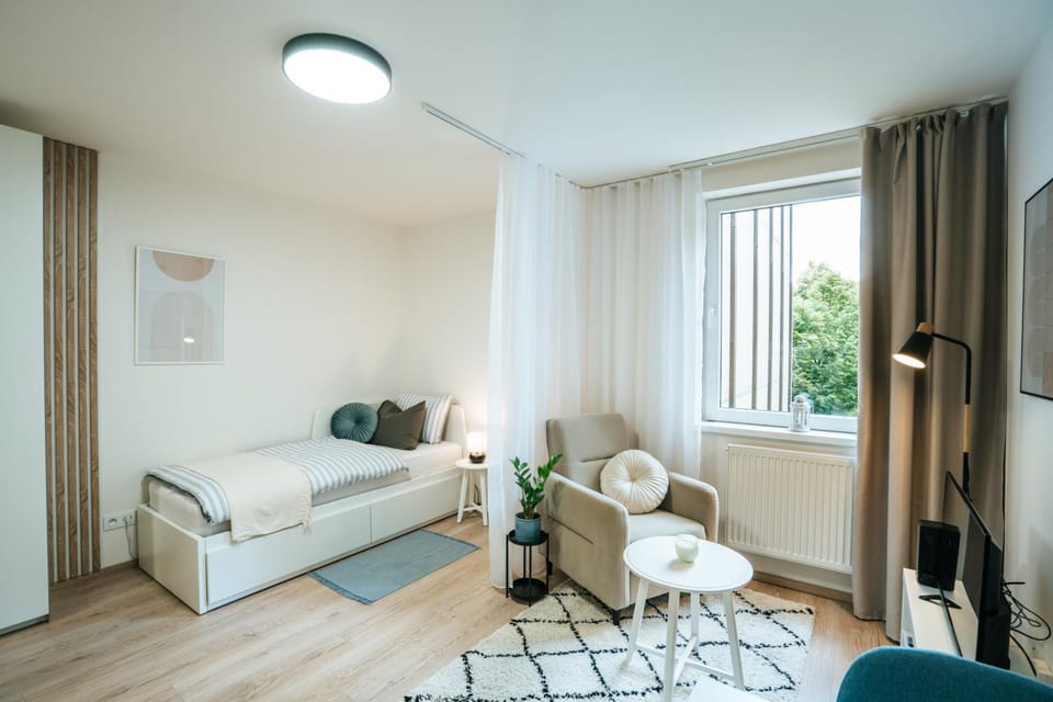 Bed, Living room, Seating area, Bedroom, heating