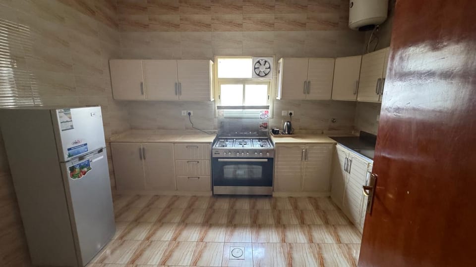 Kitchen or kitchenette, oven