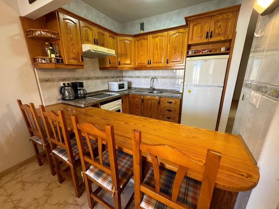 Kitchen or kitchenette, Dining area, oven, stove, toaster