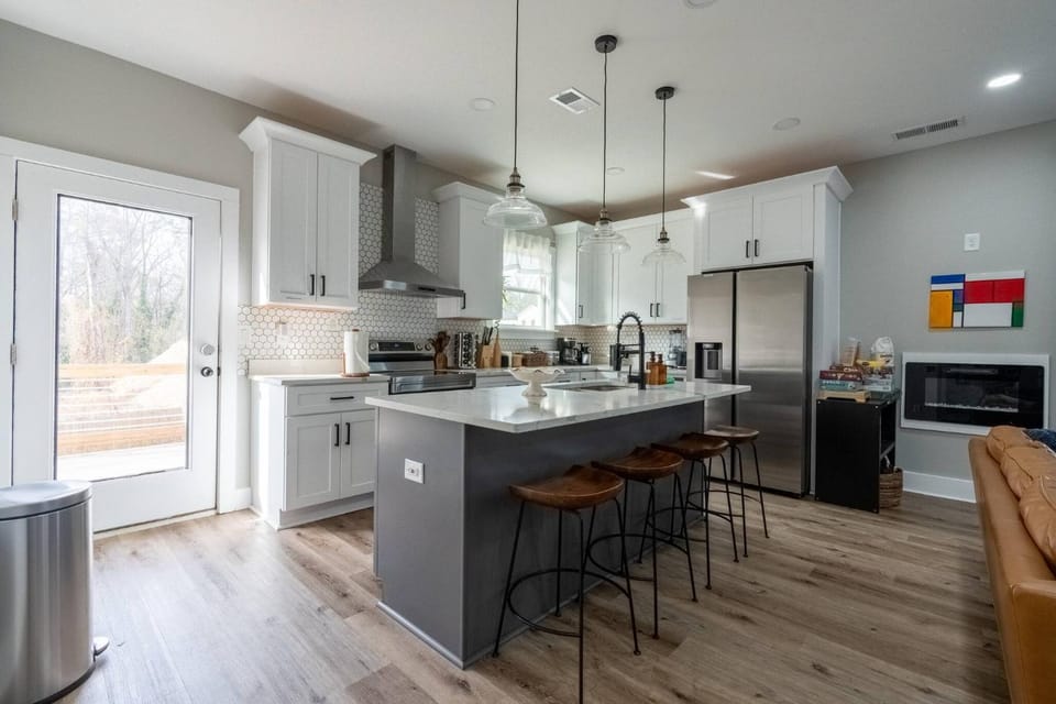 Kitchen or kitchenette, Seating area, Dining area, dishwasher, furniture, oven, stove