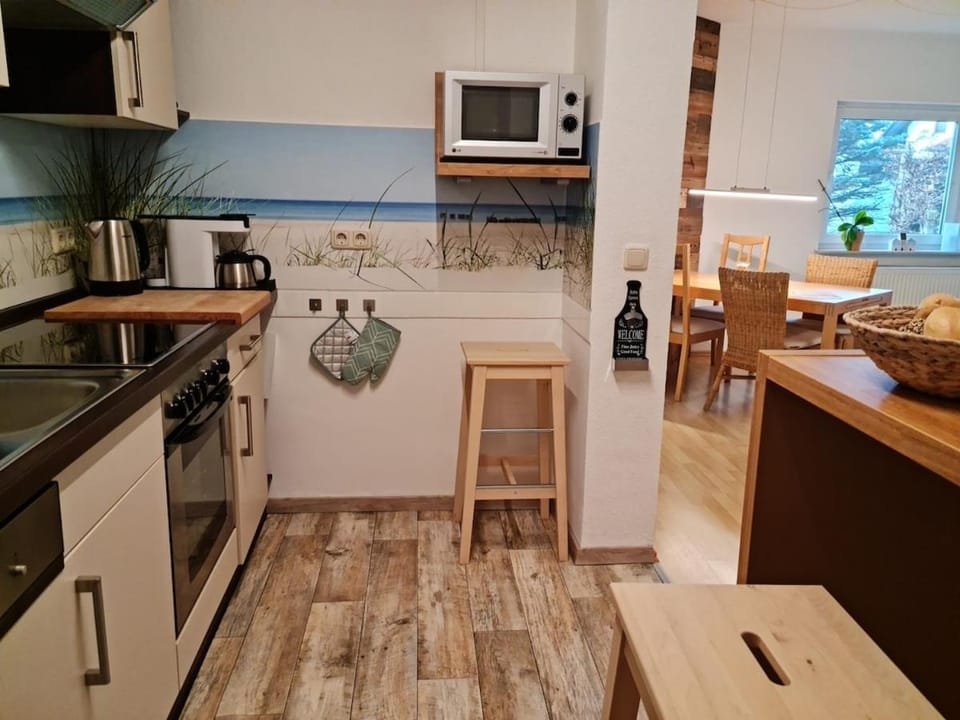 Kitchen or kitchenette, Dining area, dishwasher, microwave, oven, stove