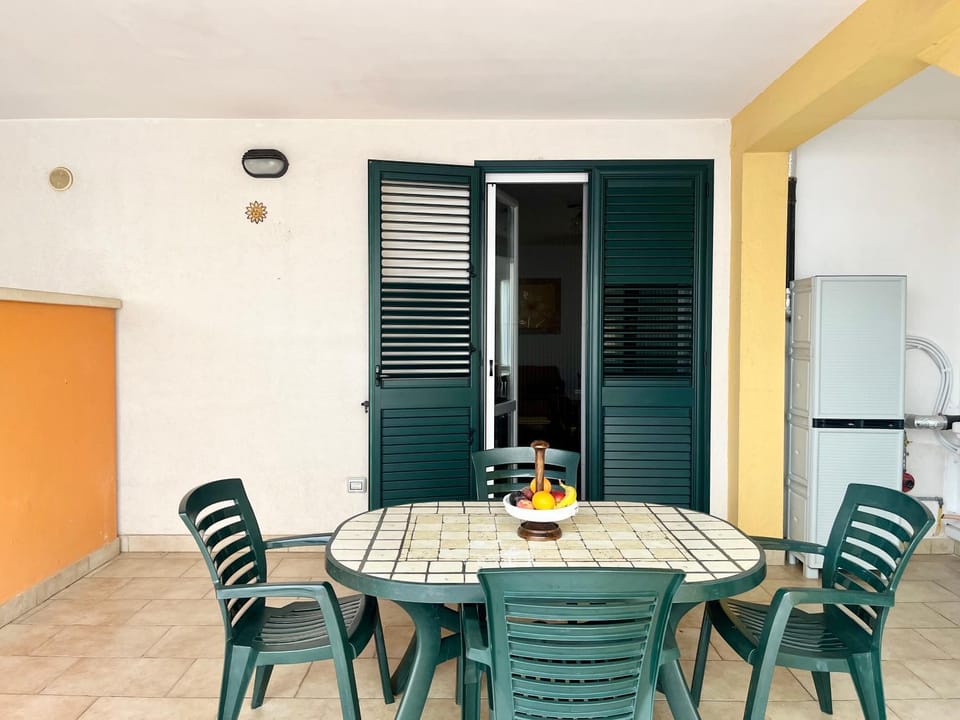 Property building, Garden, Seating area, Dining area