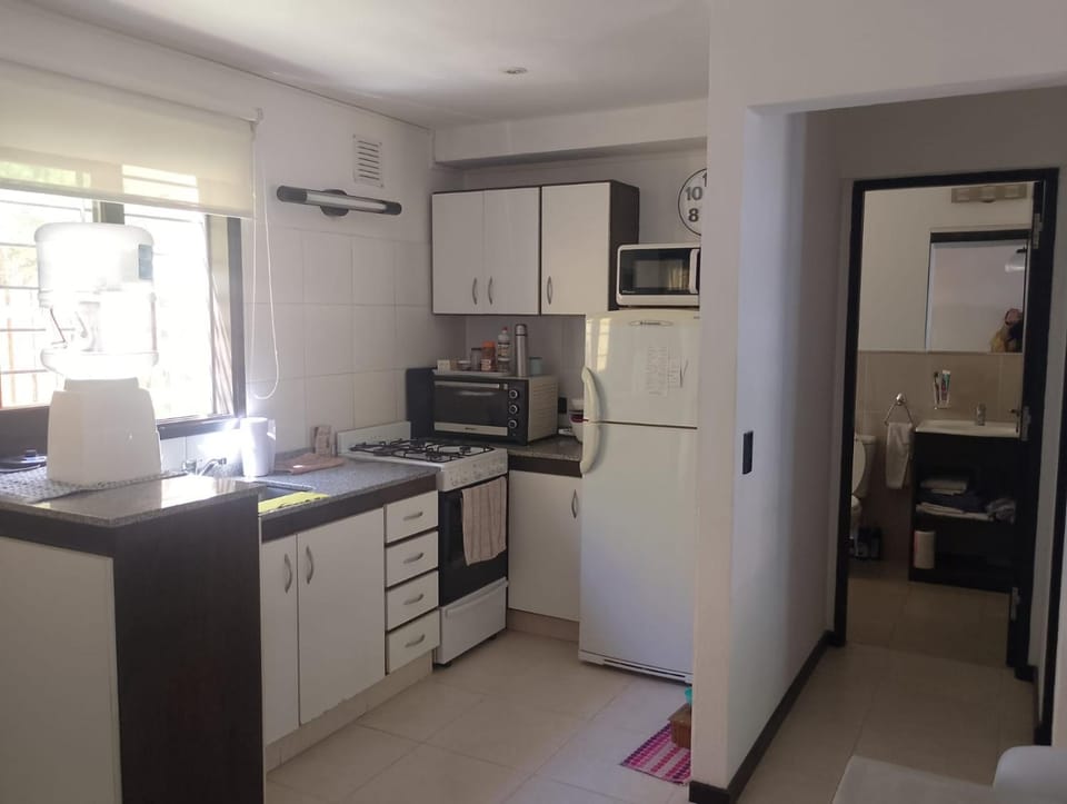 Kitchen or kitchenette, oven, stove