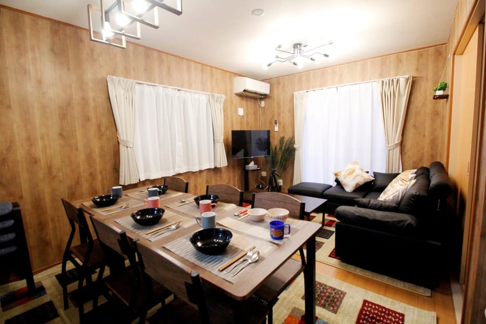 Living room, Photo of the whole room, Seating area, Dining area, Food, Meals, children, Family, air conditioner