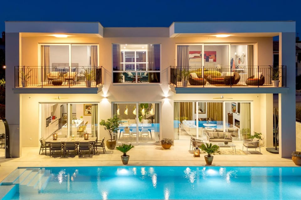 Property building, Patio, Night, Seating area, Swimming pool