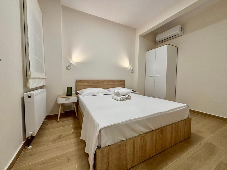 Bed, Bedroom, towels, wardrobe, air conditioner