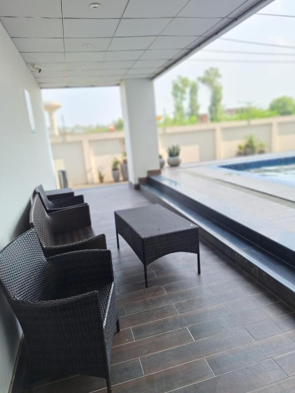 View (from property/room), Balcony/Terrace, Seating area, Swimming pool
