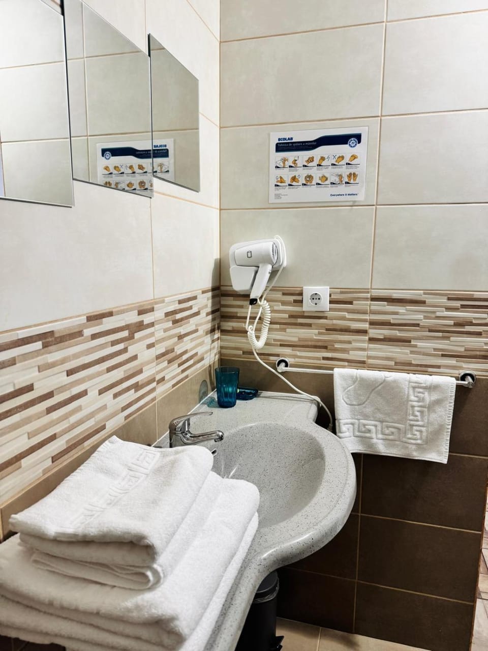 Bathroom, hair dryier, towels