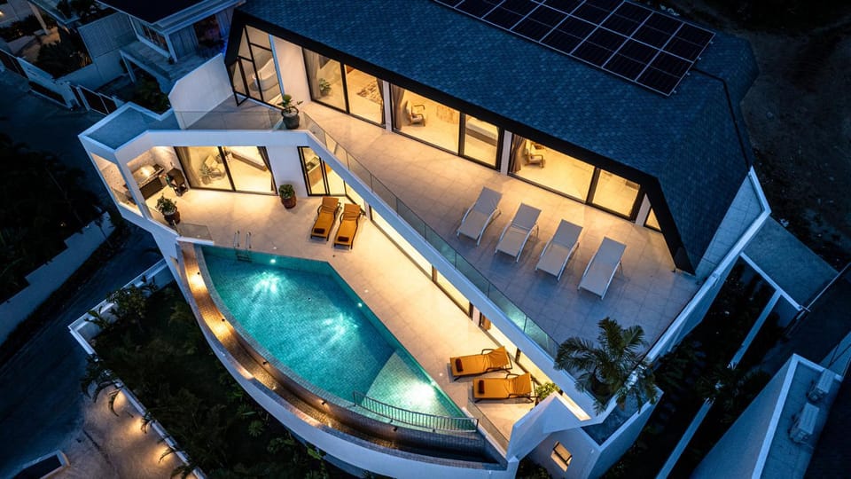 Property building, Patio, Night, Pool view, Swimming pool, Swimming pool, sunbed