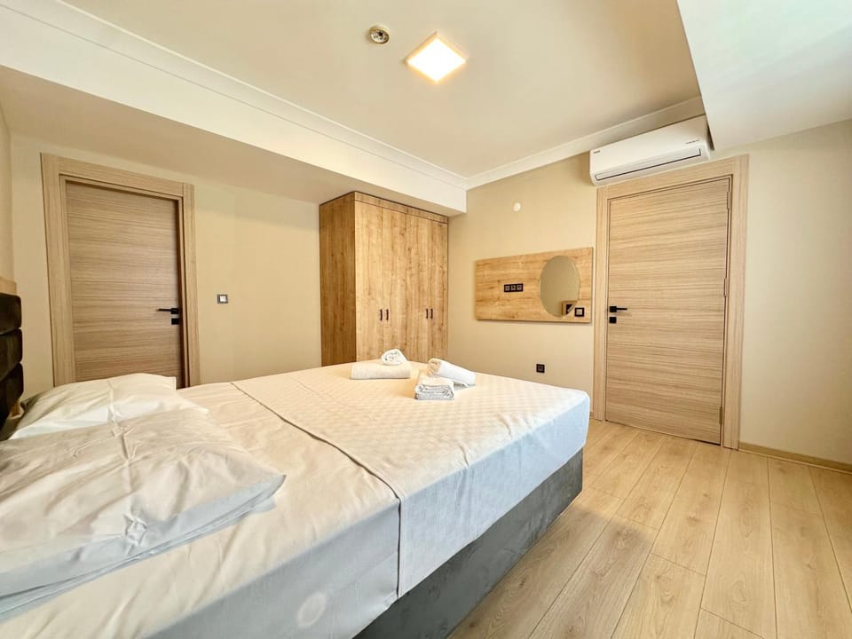 Bed, Photo of the whole room, Bedroom, towels, wardrobe, air conditioner