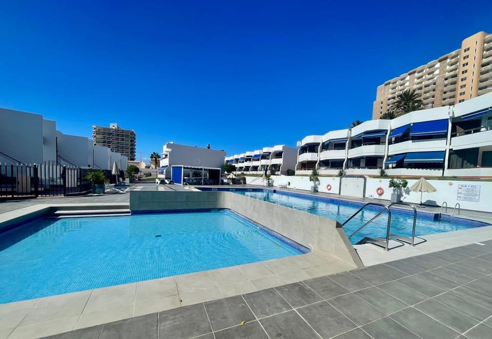 Property building, Pool view, Swimming pool, sunbed
