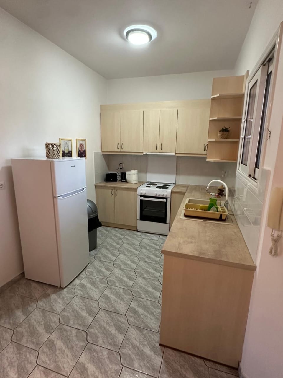 Kitchen or kitchenette, oven, stove, toaster
