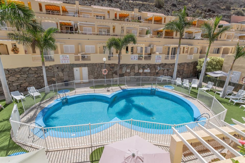 Property building, Living room, Swimming pool