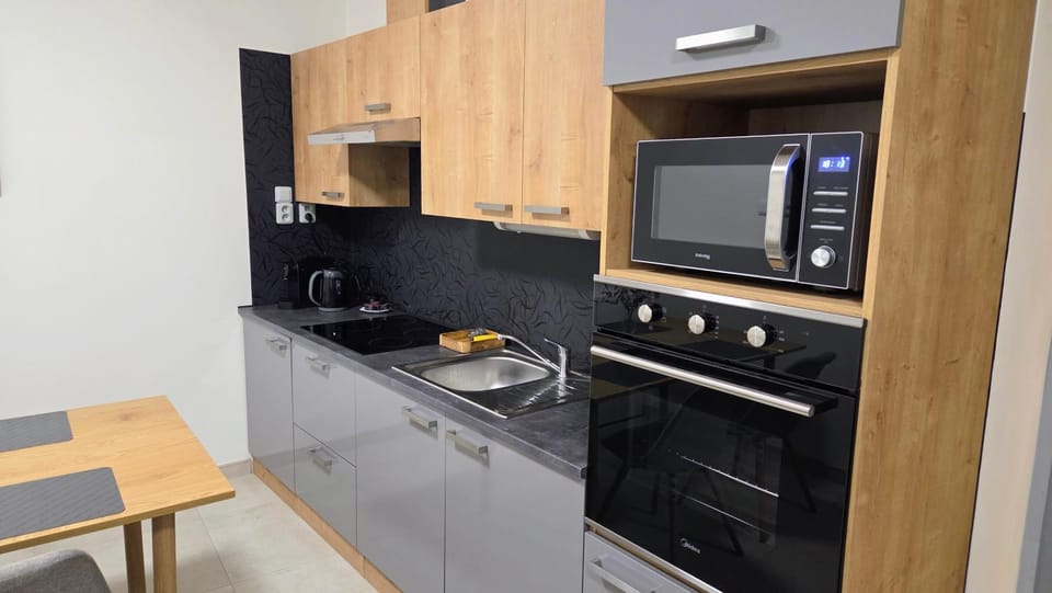 Kitchen or kitchenette, oven, stove