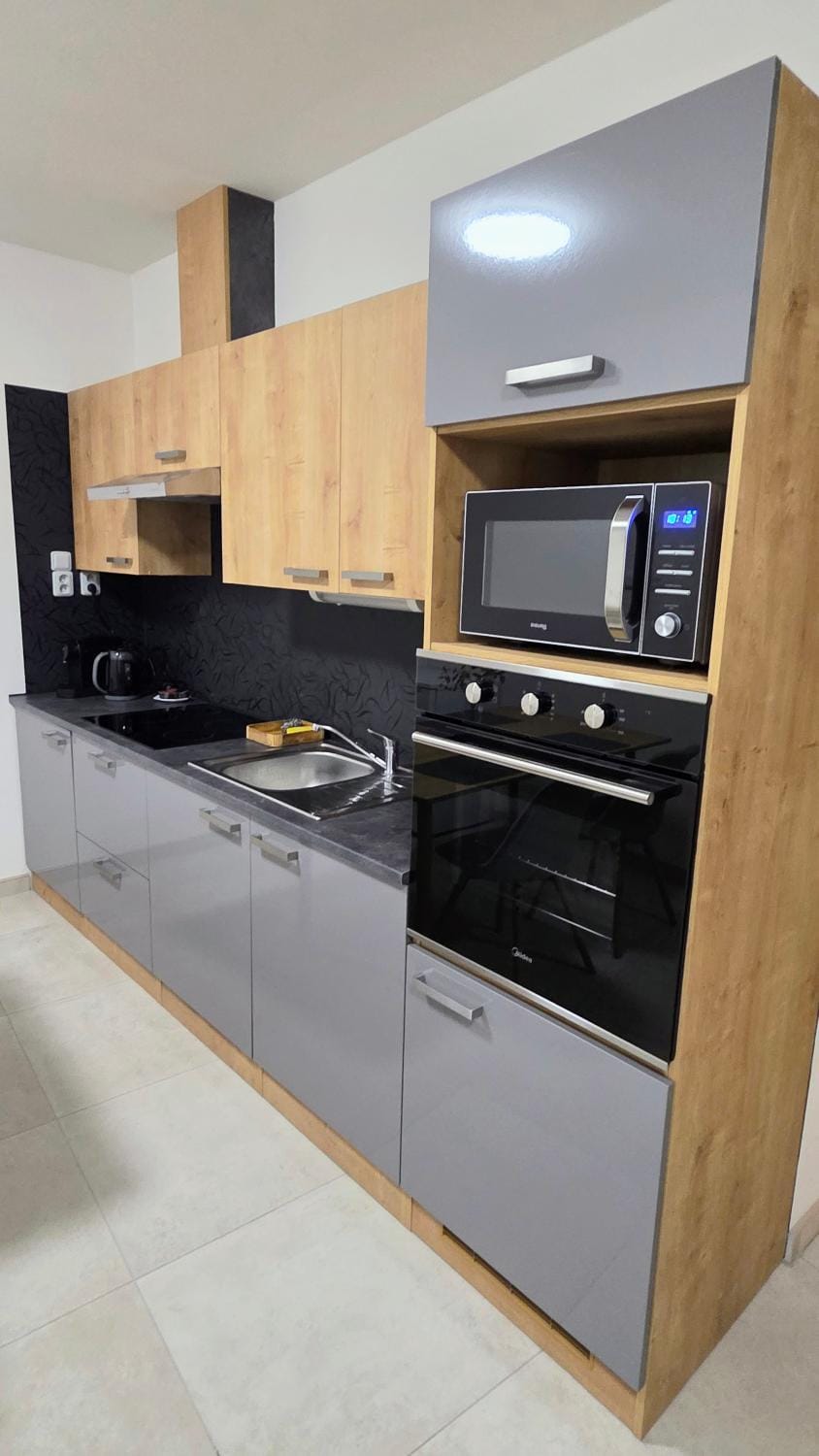 Kitchen or kitchenette, oven, stove