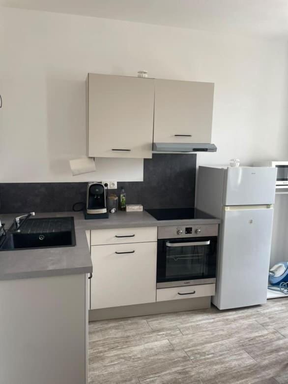 Kitchen or kitchenette, oven, stove, toaster