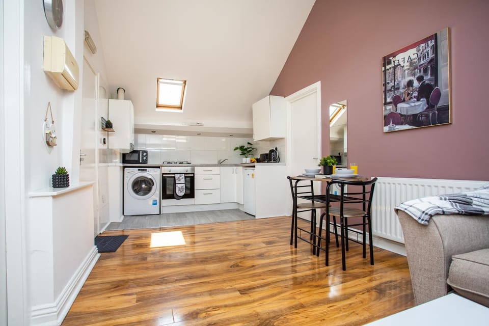 Kitchen or kitchenette, Living room, Seating area, Dining area, oven, stove, toaster, washing machine