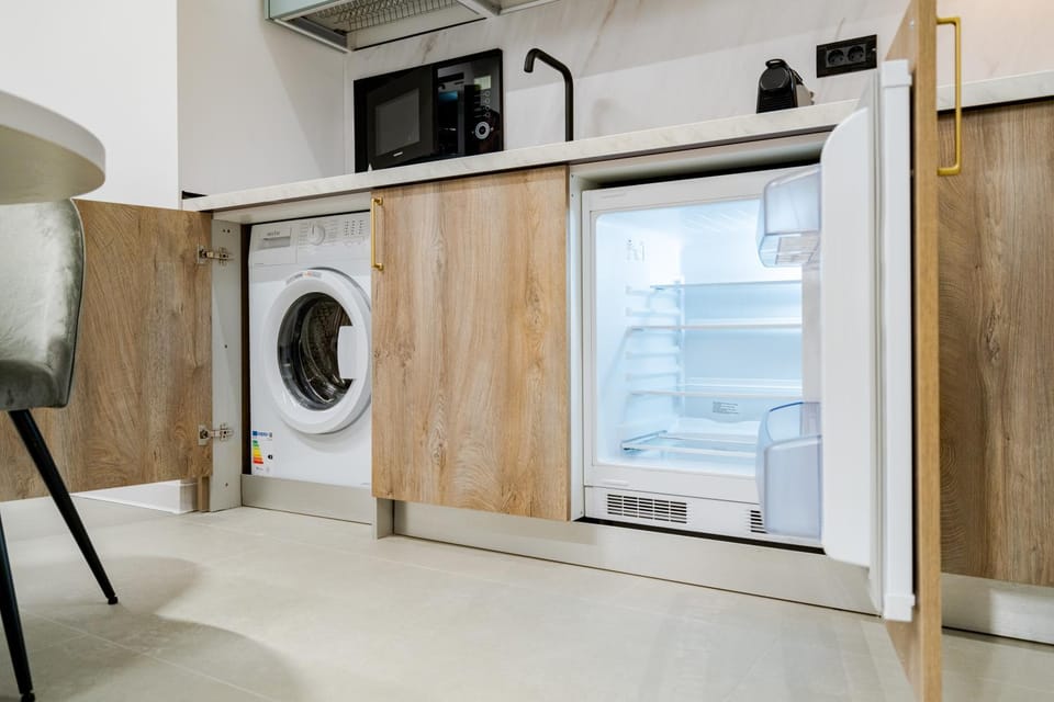 Kitchen or kitchenette, washing machine