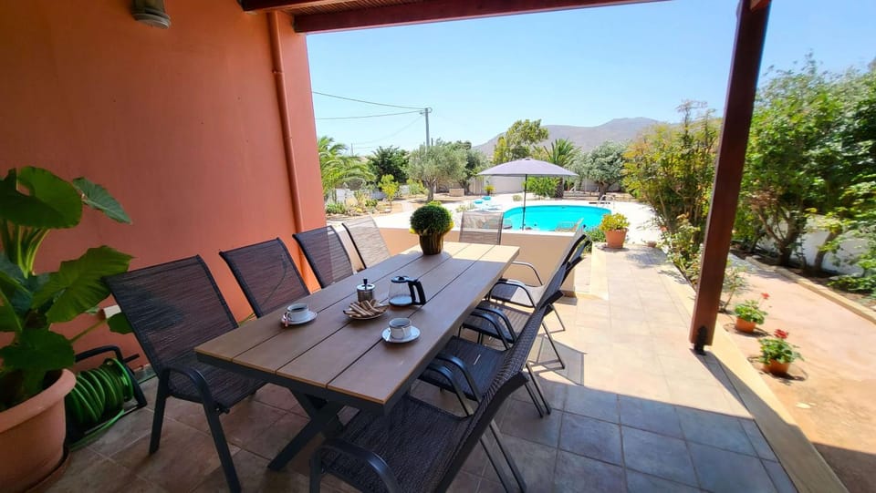 Patio, Dining area, Garden view, Pool view