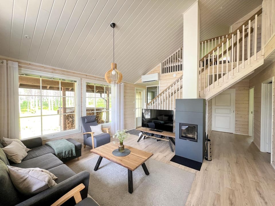 TV and multimedia, Living room, Seating area, fireplace, air conditioner