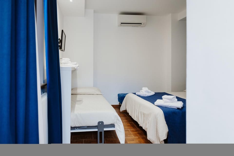 Bed, Photo of the whole room, Bedroom, towels, air conditioner