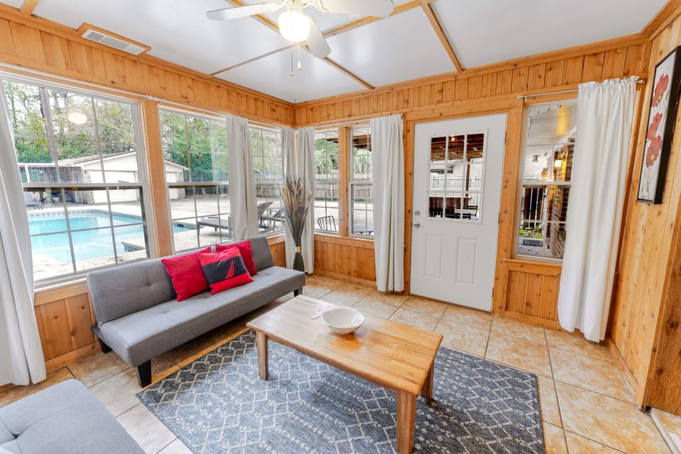 Living room, Seating area, Pool view