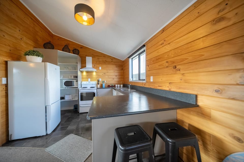 Kitchen or kitchenette, oven, stove