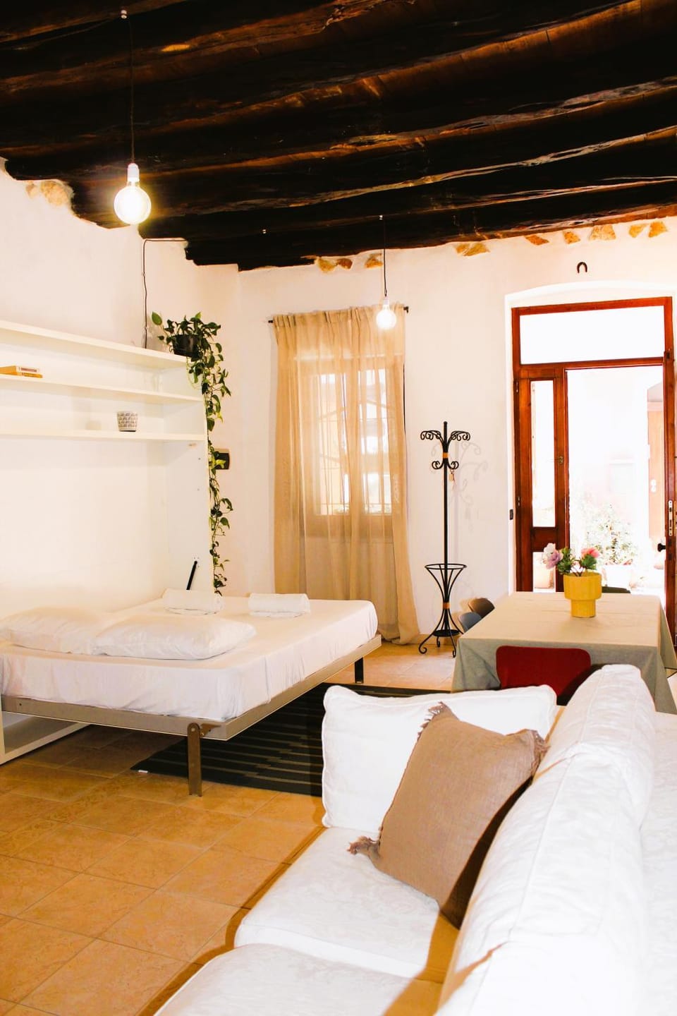 Bed, Living room, Seating area, Bedroom, air conditioner