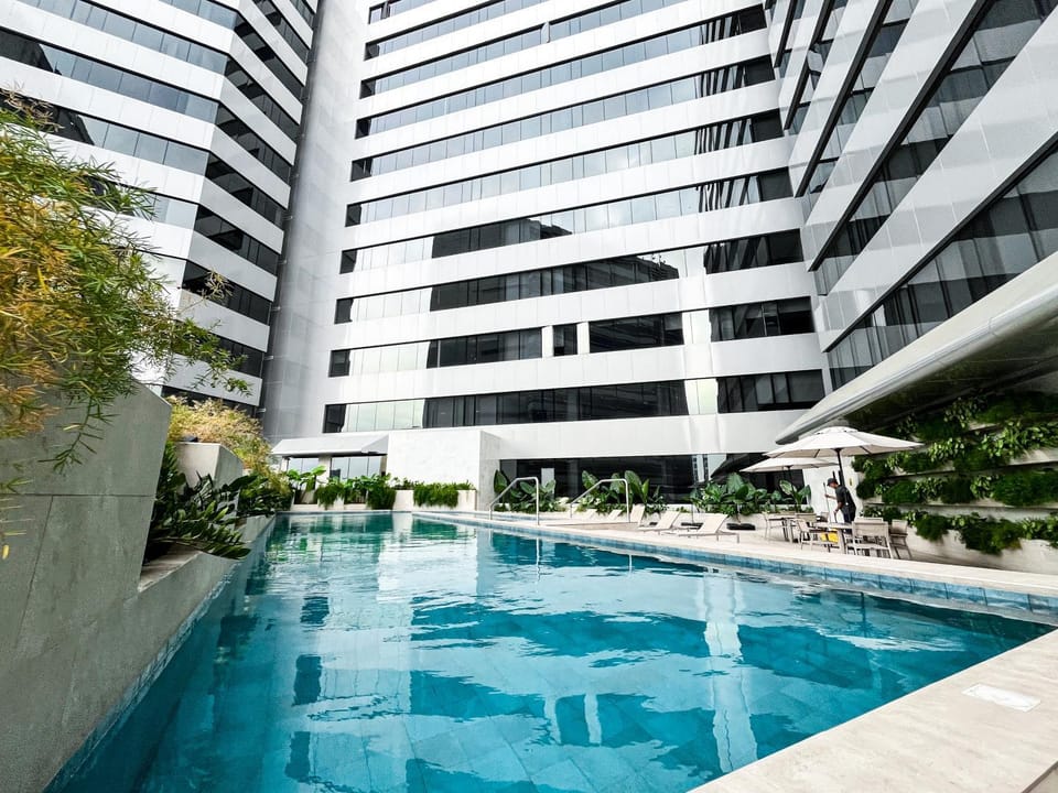 Property building, Day, Pool view, Swimming pool, sunbed