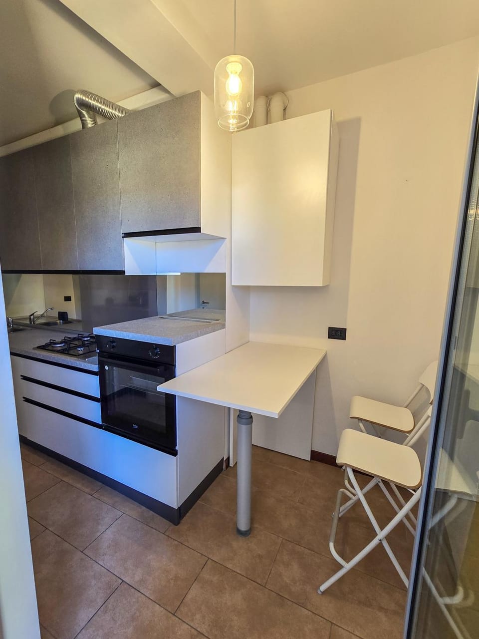 Kitchen or kitchenette, stove