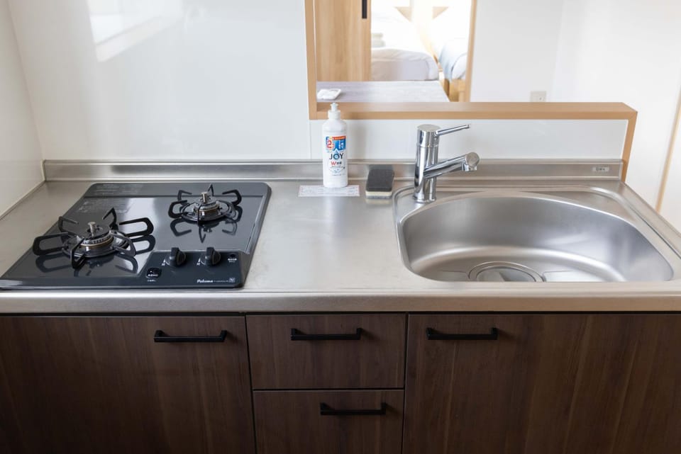 Kitchen or kitchenette, stove