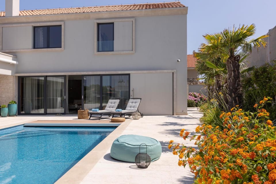Property building, Day, Seating area, Pool view, Swimming pool, sunbed