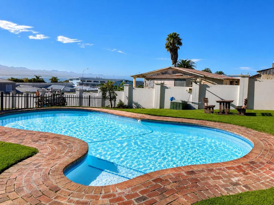 Property building, Patio, Day, Natural landscape, Garden, Garden view, Pool view, Swimming pool