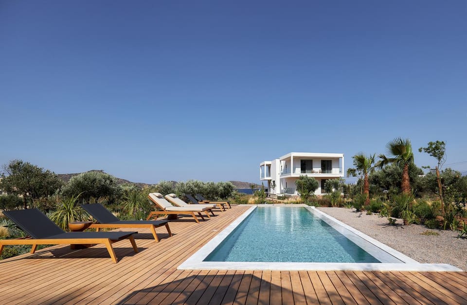 Property building, Patio, Natural landscape, Swimming pool, sunbed