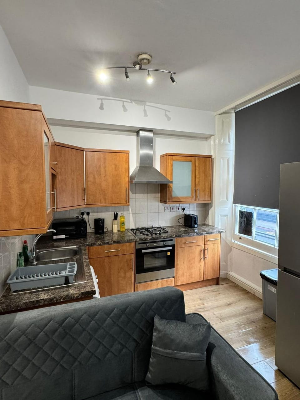 Kitchen or kitchenette, dishwasher, oven, stove, toaster