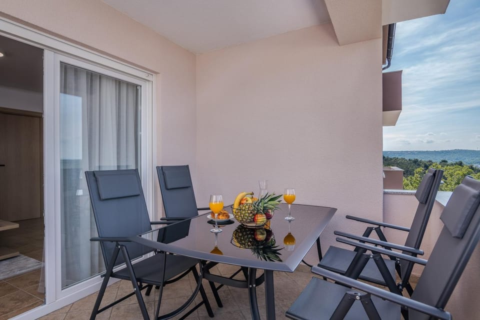 Apartment TRIES 3 with heated pool and sea view Apartment in Primorje-Gorski Kotar County