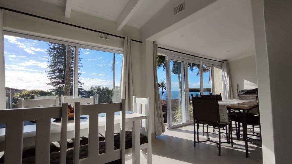 View (from property/room), Living room, Seating area, Dining area