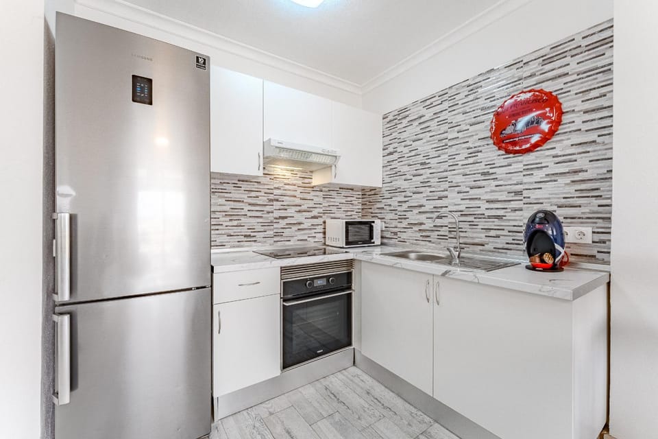 Kitchen or kitchenette, microwave, oven