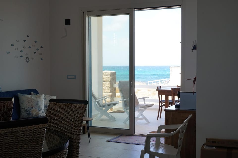Natural landscape, View (from property/room), Balcony/Terrace, Living room, Seating area, Dining area, Beach, Sea view