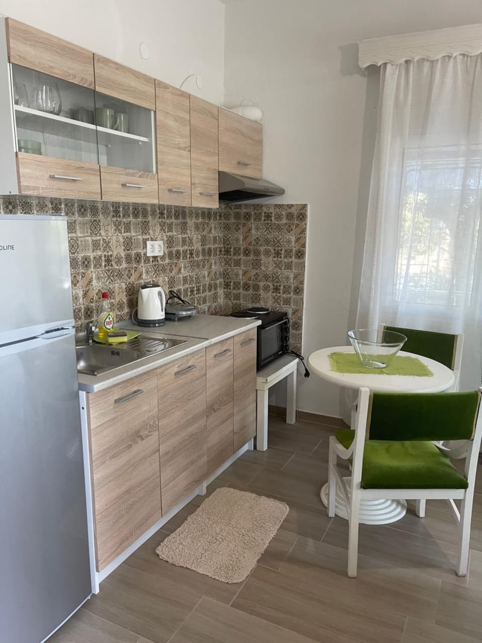 Kitchen or kitchenette, oven, stove