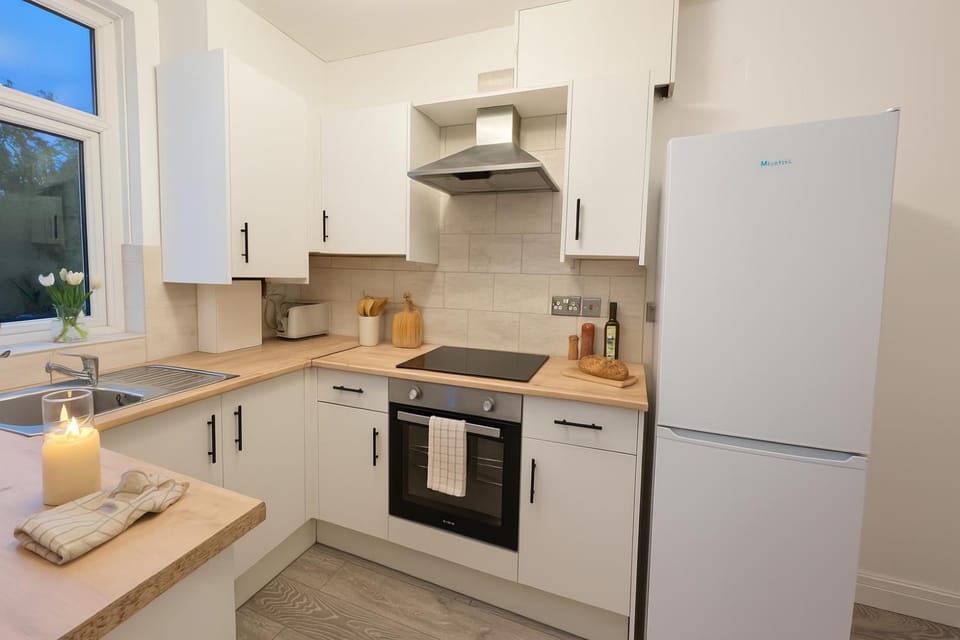 Kitchen or kitchenette, oven, stove, toaster