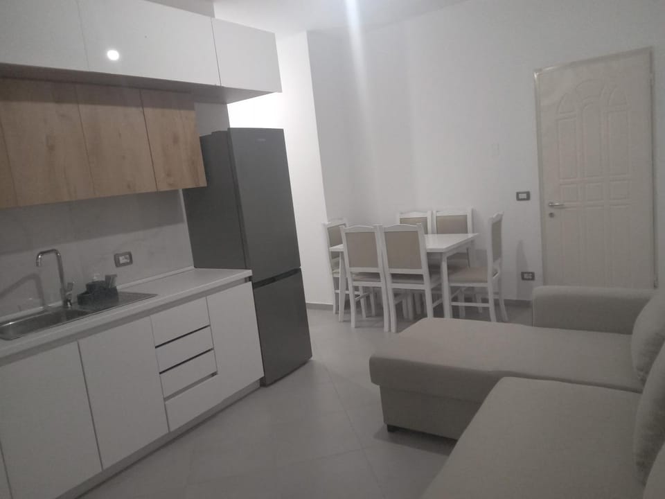 Kitchen or kitchenette, Living room, Seating area, Dining area