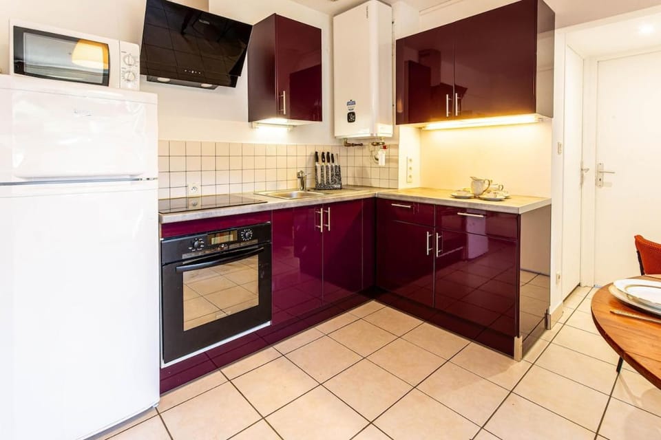 Kitchen or kitchenette, oven, stove, toaster
