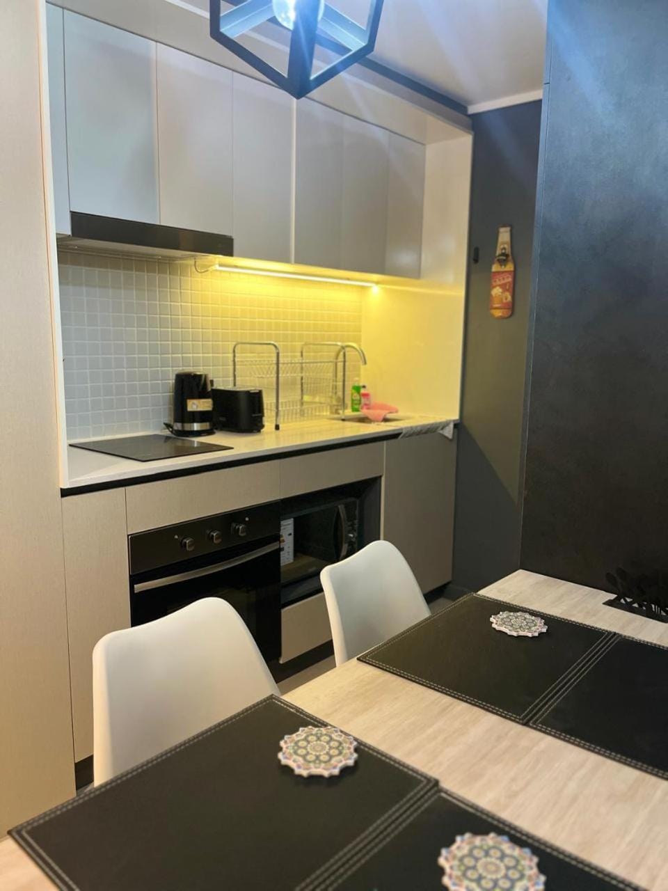 Kitchen or kitchenette, stove, toaster