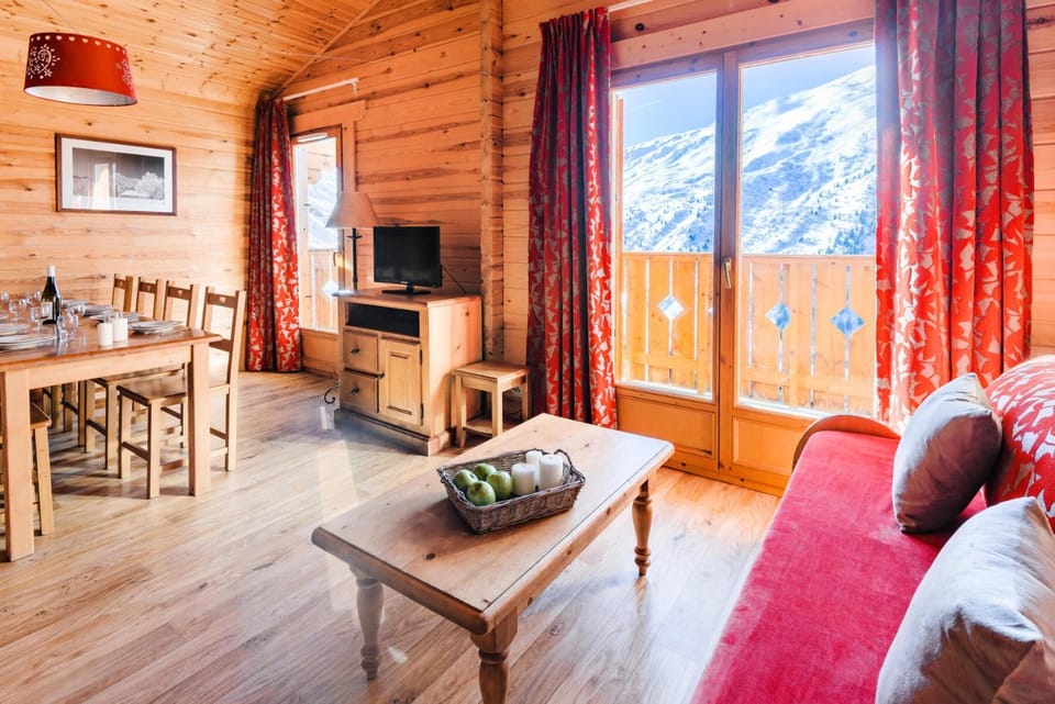 Bed, fireplace, kitchen