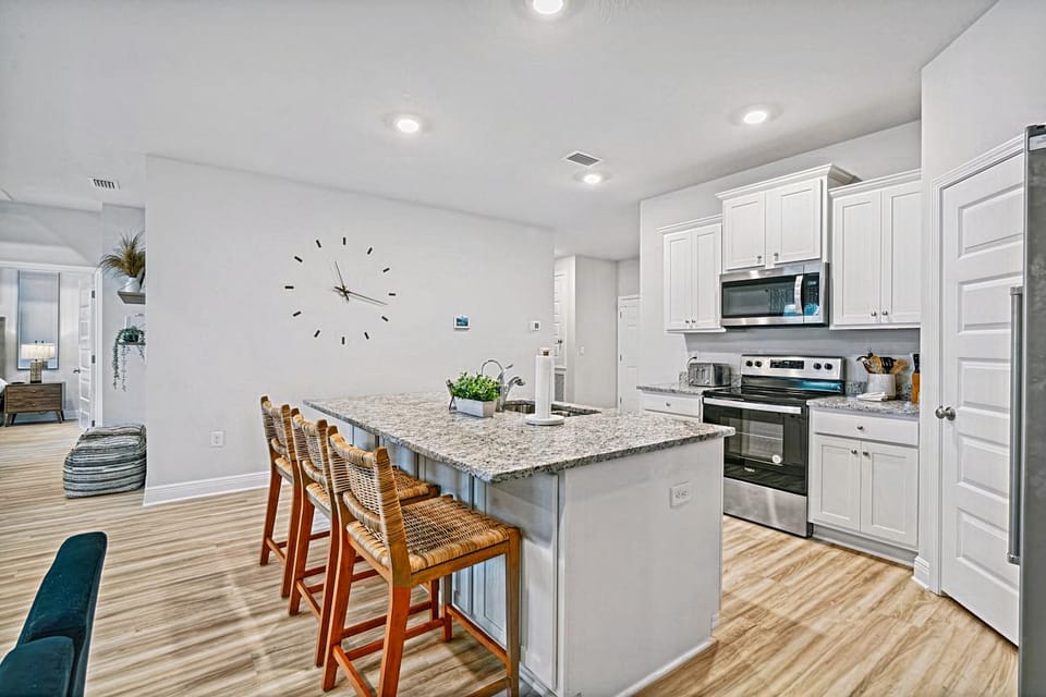 Kitchen or kitchenette, dishwasher, oven, stove, toaster