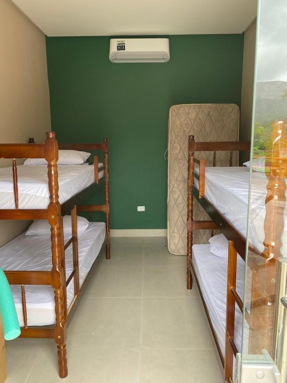 bunk bed, towels, air conditioner