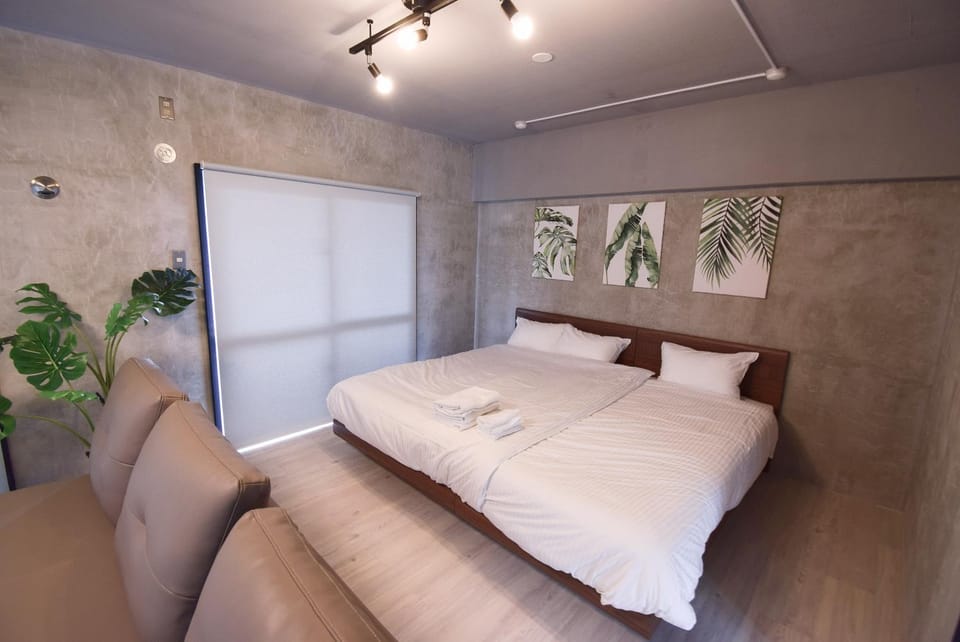 2-101号広いワンルームナカマコンド恩納小学生まで添い寝無料 Apartment hotel in Okinawa Prefecture