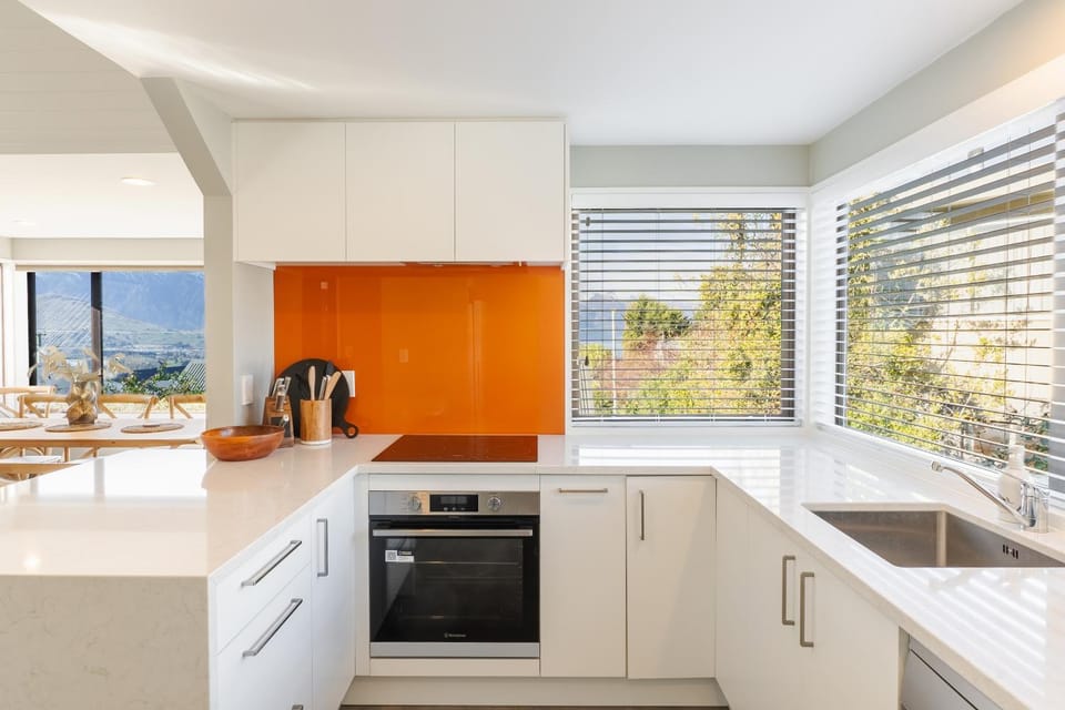 Kitchen or kitchenette, dishwasher, oven, stove